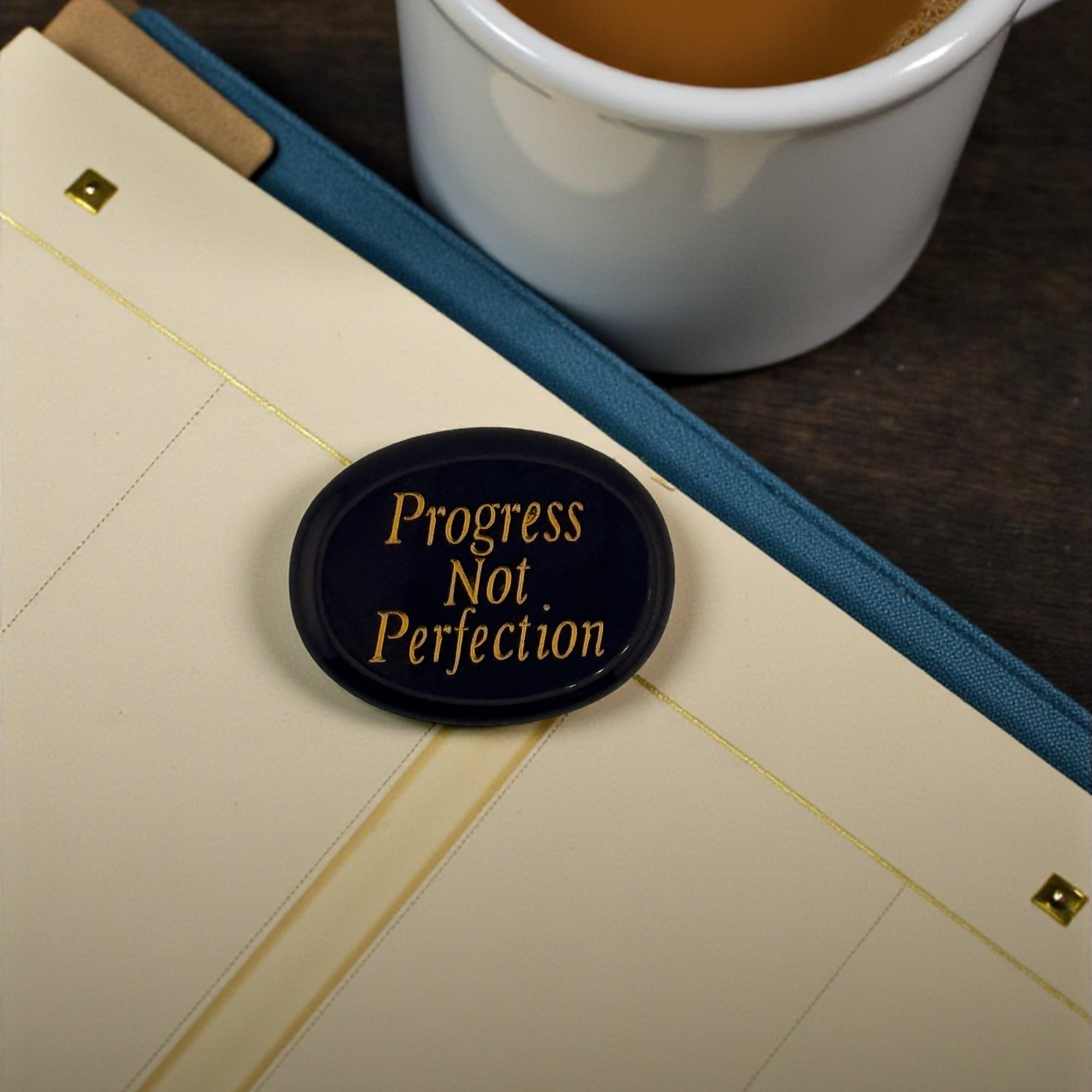 Black obsidian stone on journal